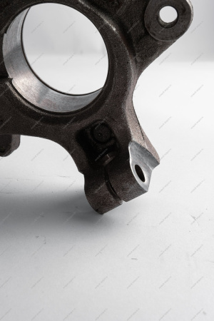 Кулак LADA Largus поворотный левый с АБС 100мм нов.обр. под болт D10мм Renault