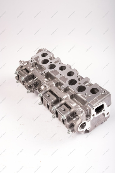 Головка блока цилиндров без шпилек в сборе (с направляющими втулками, без клапанов и вала распределительного) без шпилек LADA Largus (FL) NEW Lada