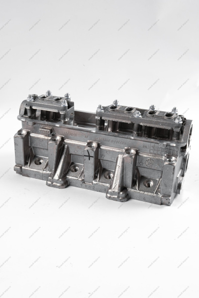 Головка блока цилиндров без шпилек в сборе (с направляющими втулками, без клапанов и вала распределительного) АвтоВАЗ