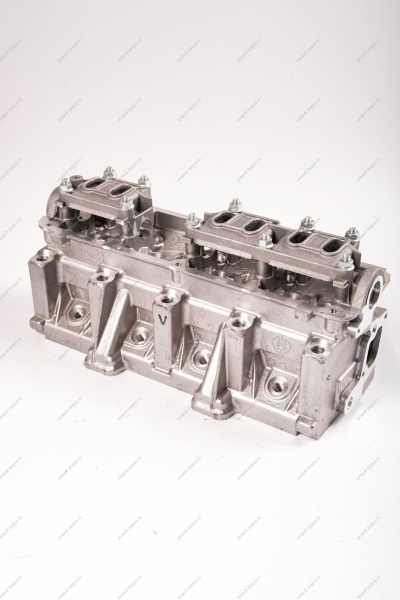 Головка блока цилиндров без шпилек в сборе (с направляющими втулками, без клапанов и вала распределительного) без шпилек LADA Largus (FL) NEW Lada