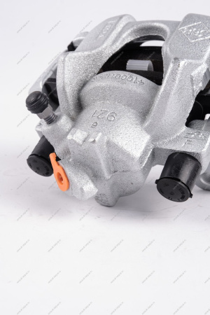 Суппорт тормоза передний левый (+2шт. тормозн. колодки 410602581R) Renault Logan II, Sandero II Renault