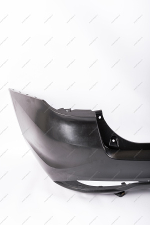 Бампер задний неокрашенный без отверстий под датчики системы парковки LADA Vesta FL Lada